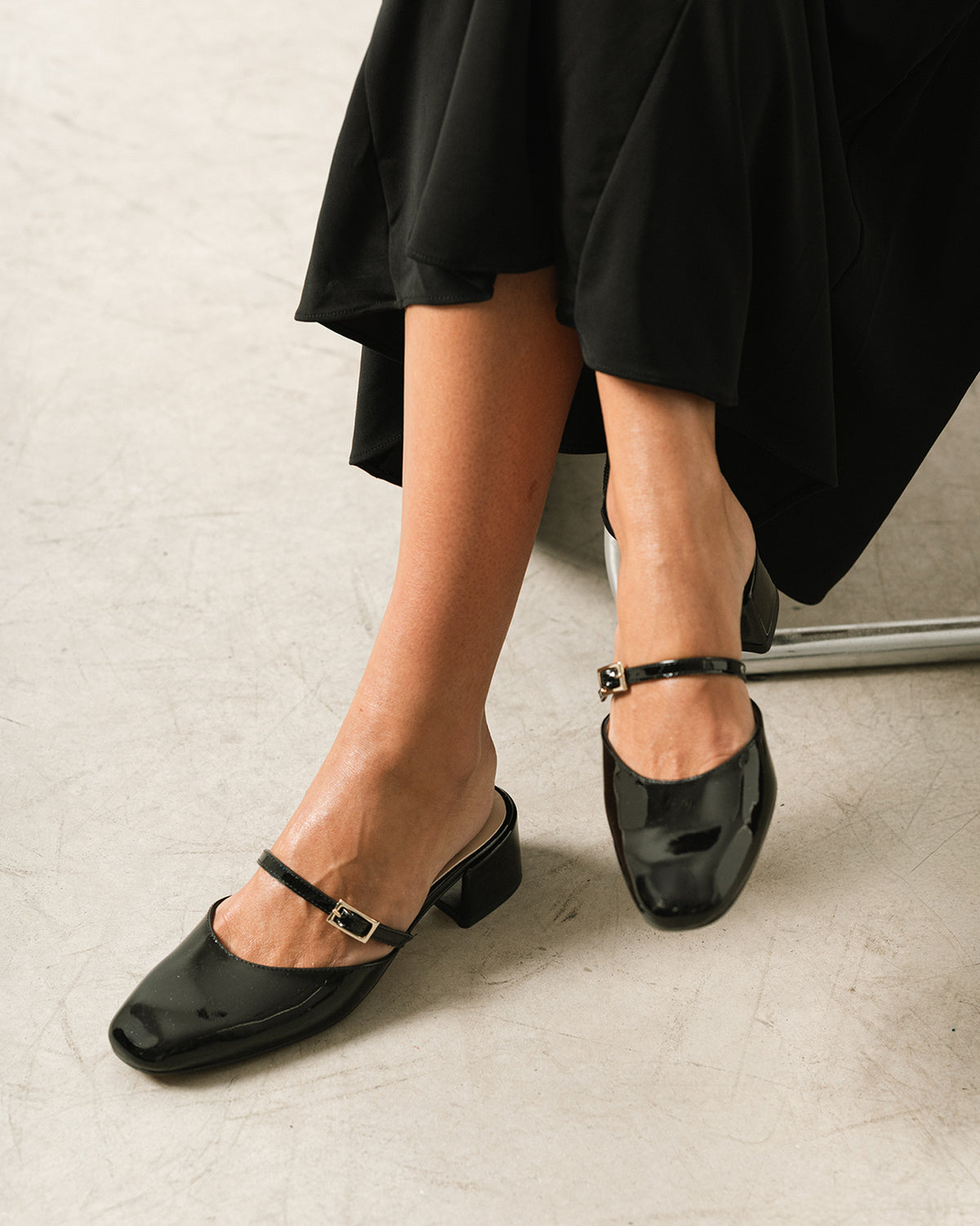 Black patent leather heeled mule