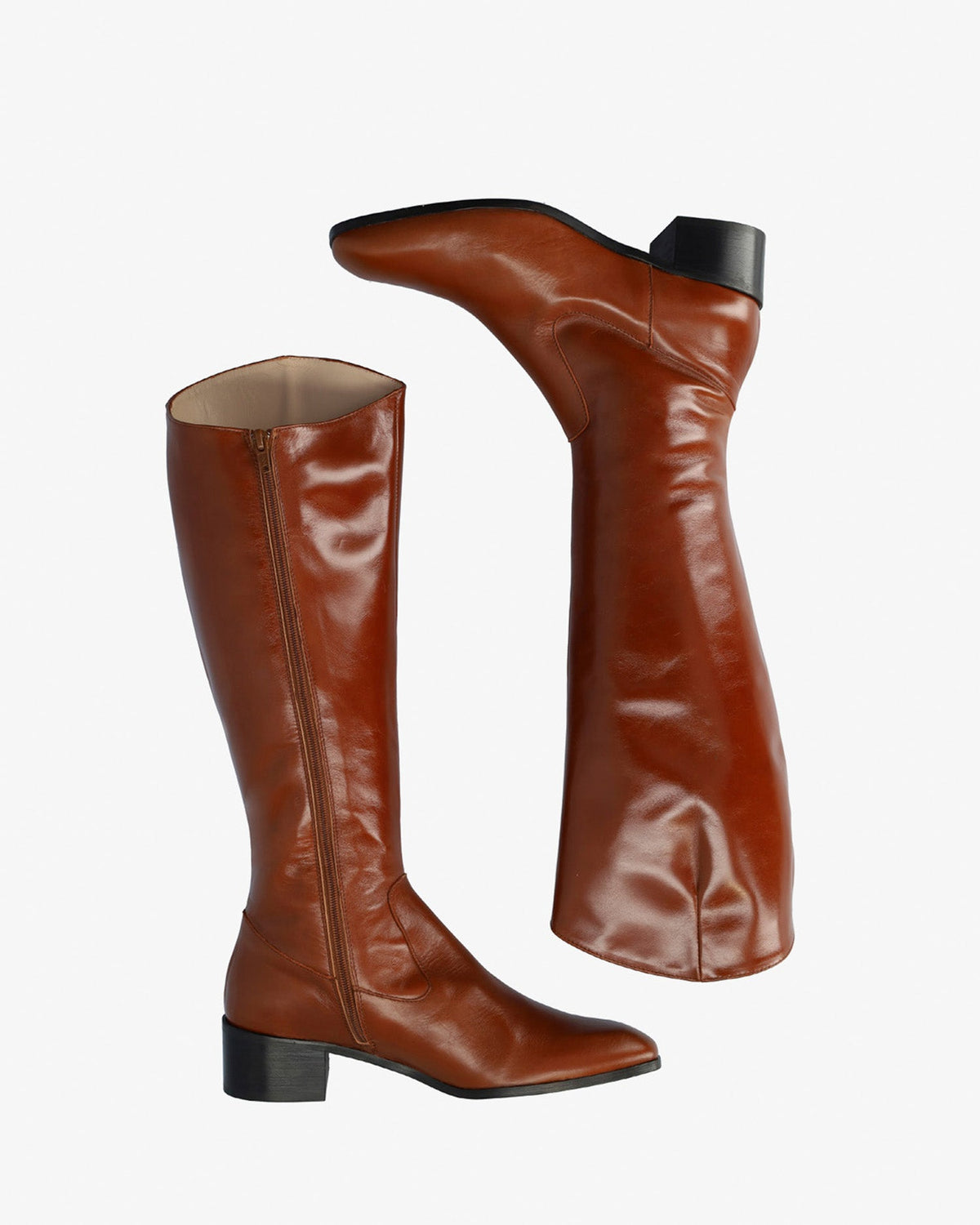 Knee-high heeled boots in brown leather