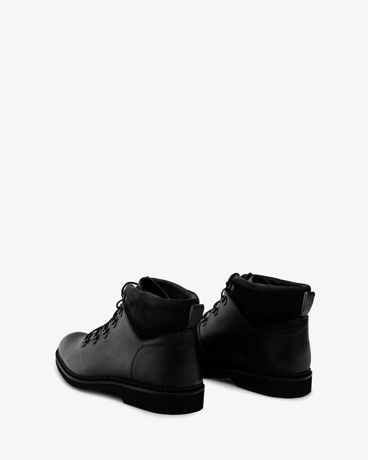 Black embossed leather ankle boot