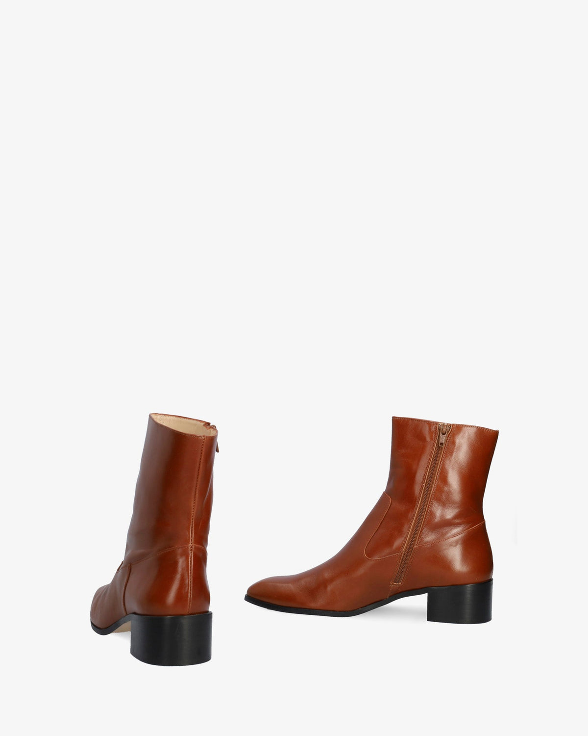 Heeled booties in brown leather