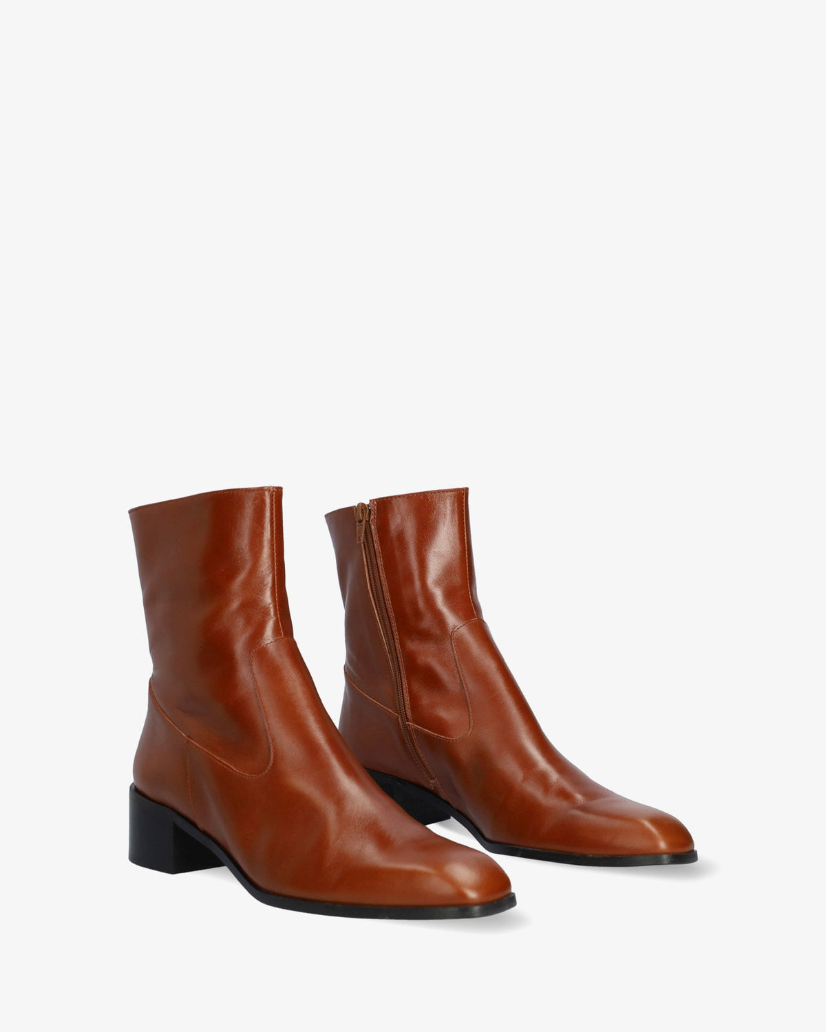 Heeled booties in brown leather