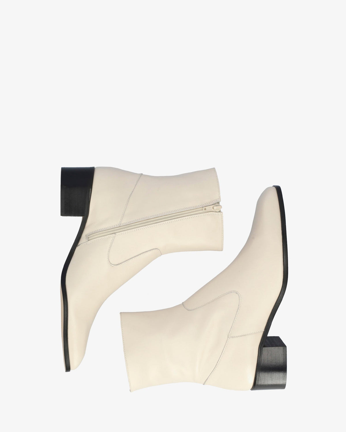 Heeled booties in off-white leather