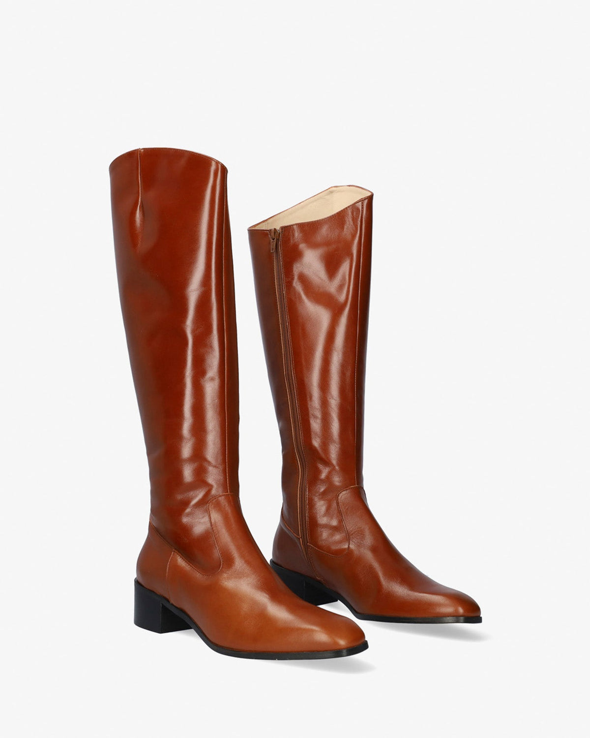 Knee-high heeled boots in brown leather