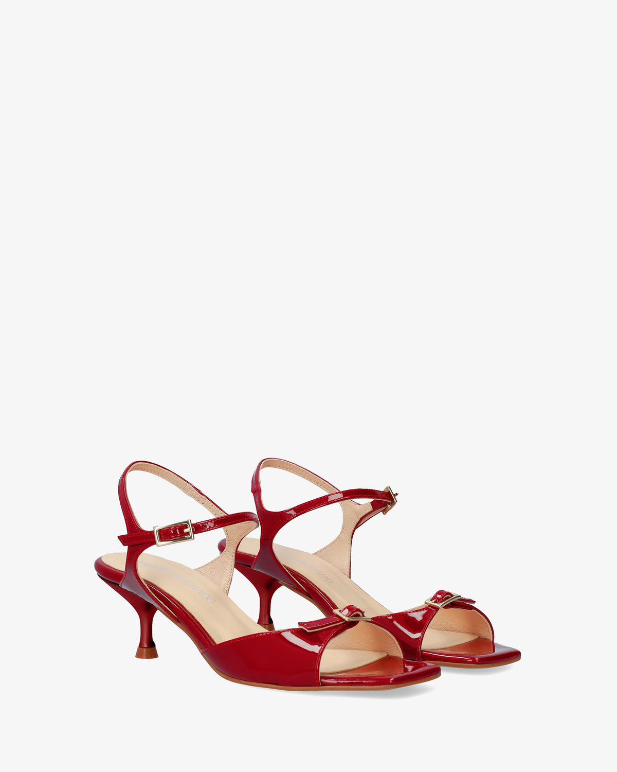 Burgundy patent leather sandal with a heel