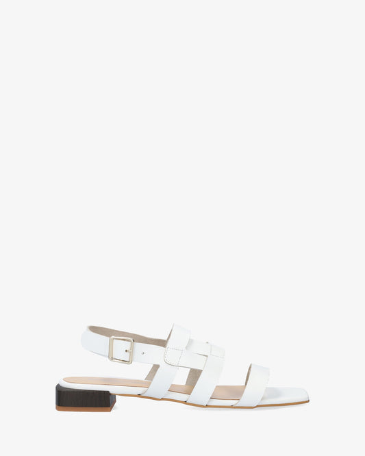 Flat sandal in white leather