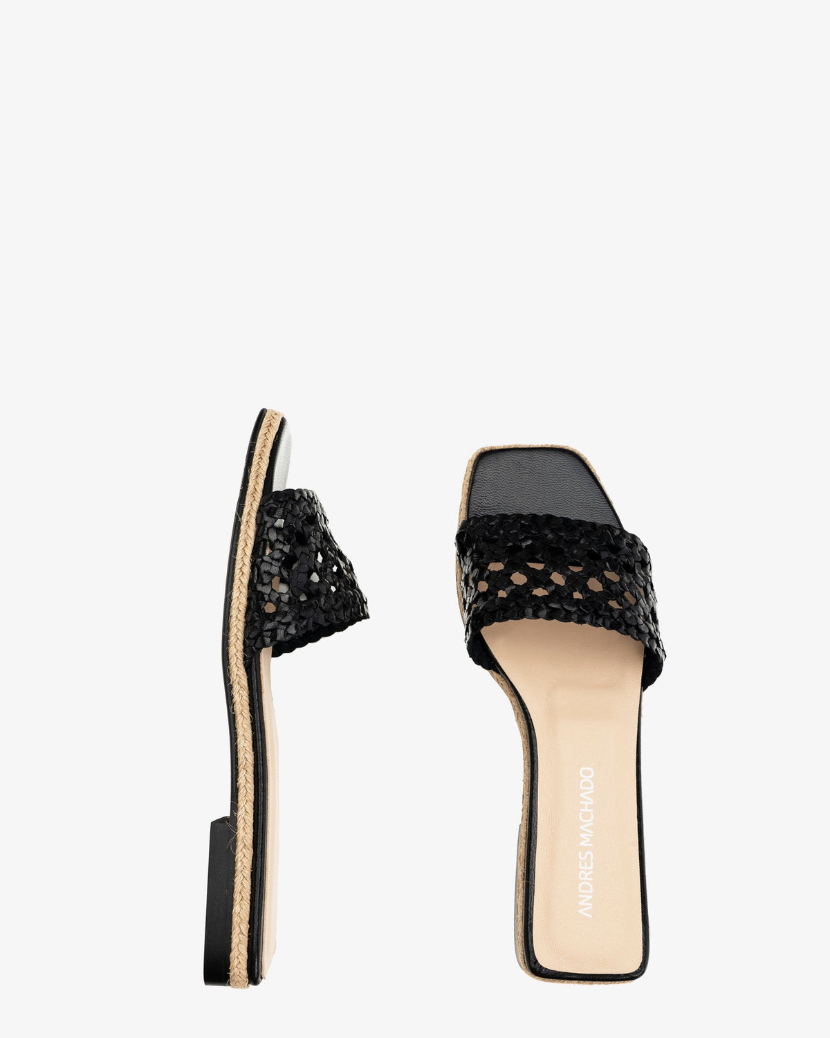 Flat sandal in braided black leather